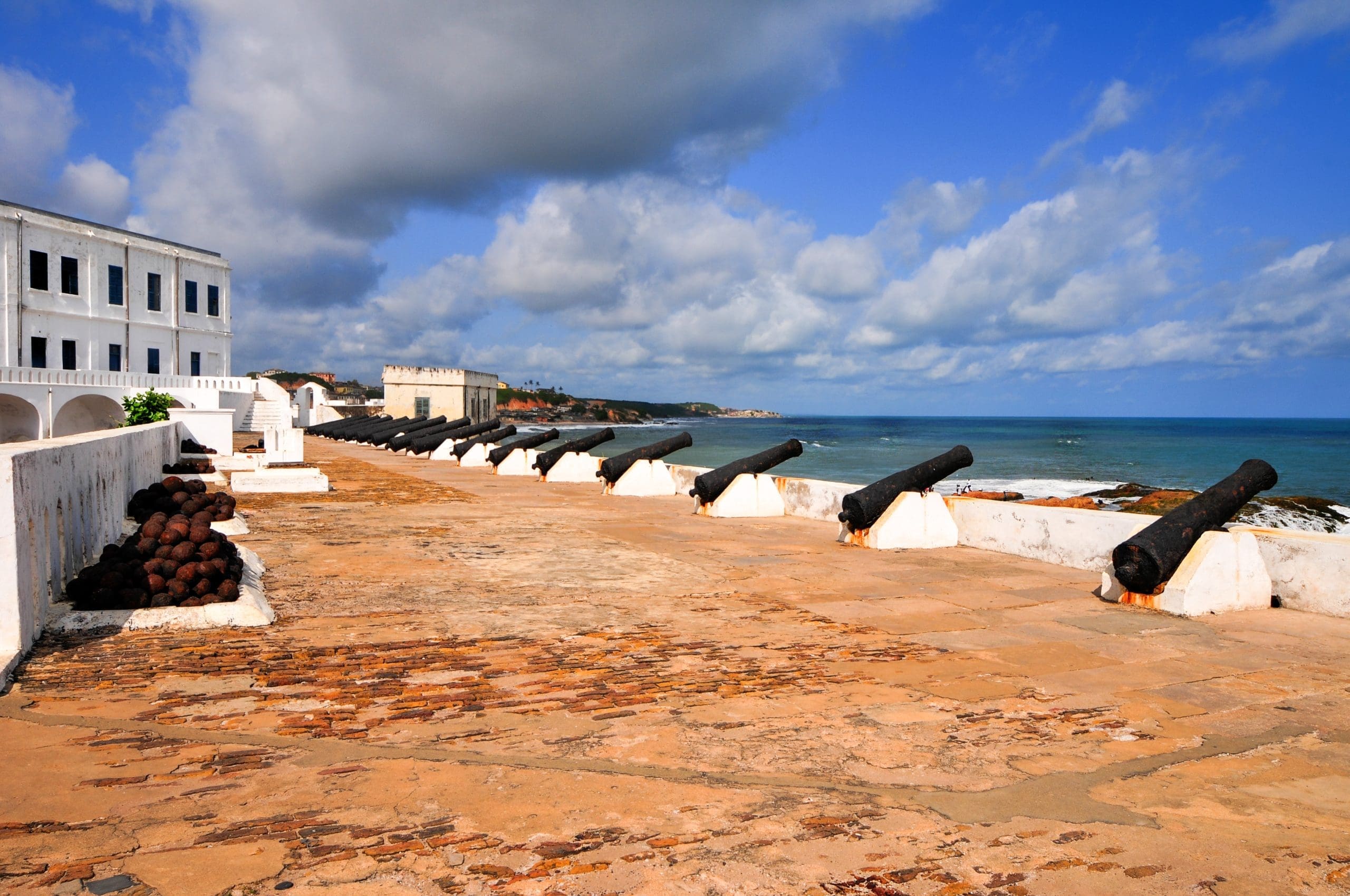 Cannons overlooking from Cape Coast Castle. Cape Coast Castle is a fortification in Ghana 